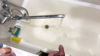 Pissing neatly in the bathroom with a big beautiful dick POV