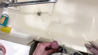 Pissing neatly in the bathroom with a big beautiful dick POV