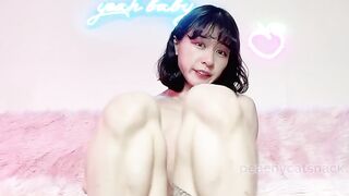 Cute fit squatting Asian girl pleasures her big clit while dripping pussy juices