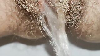 Delicious hairy pussy pissing mega close up