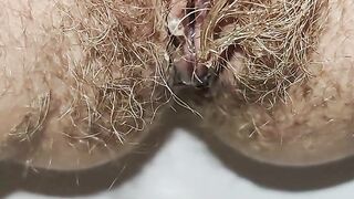 Delicious hairy pussy pissing mega close up