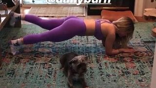 Joanna ''JoJo'' Levesque doing hot yoga on the floor