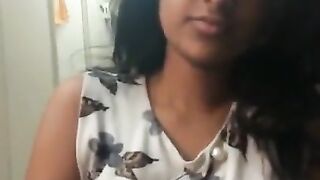 Indian girl sucking small cork