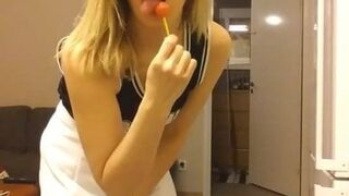 blonde amateur teasing with a lollipop