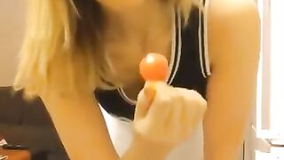 blonde amateur teasing with a lollipop