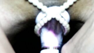 Straps on Pussy Eating Machine and Busts out of her Pearls Close up Orgasm