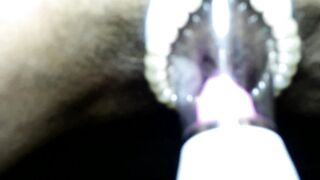 Straps on Pussy Eating Machine and Busts out of her Pearls Close up Orgasm