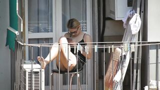 Candid Blonde Babe Showing her Feet on the Balcony