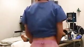 Nurse showing off in behind doctor & customer