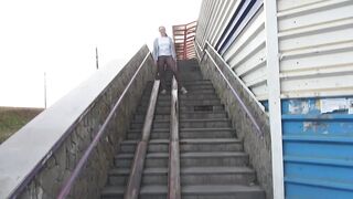 Mature Milfs Pissing on the Stairs of Public Transition