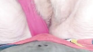 Mature pussy close-up showing pink clit