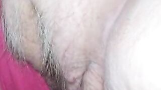 Mature pussy close-up showing pink clit