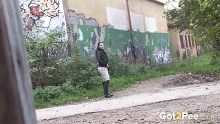 Brunette In Knee Boots Enjoys Public Piss