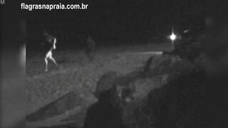 I filmed a couple having sex on the beach at night. A security guard put them to run