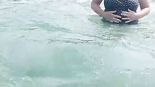 Flashing tits to old men at public beach