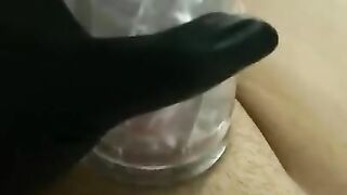 Black latex glove hand job