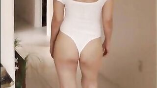 Asian MILF in white body suit