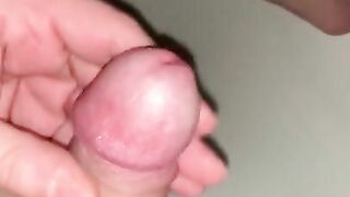 nude male does quick soft to hard handjob with uncut cock lots of cum