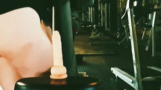 Public Gym Riding Dildo exercise (almost caught by stranger)