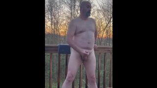 Masturbating on the deck while enjoying nature and the sunrise