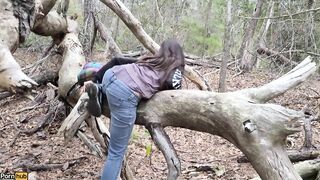 She Pees While Sitting in a Fallen Tree