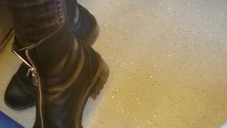 Hot blonde milf in boots in train catches me filming her?