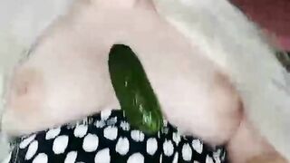 masturbating pussy with cucumber