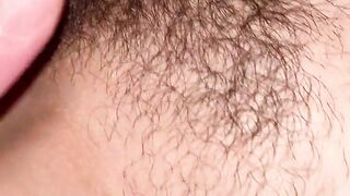 Hairy pussy squirting during fingering