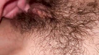 Hairy pussy squirting during fingering