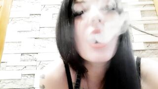 Smoking fetish from Dominatrix Nika.  How sexy and erotic this Mistress smokes