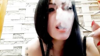 Smoking fetish from Dominatrix Nika.  How sexy and erotic this Mistress smokes