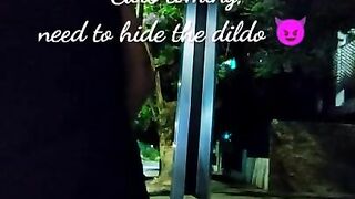 Sissy slut sitting on a huge dildo in public bus station at night while cars pass by