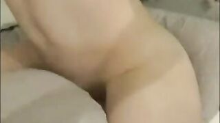 Fit girl showing off her muscles and pussy, and she masturbate with pillow humping