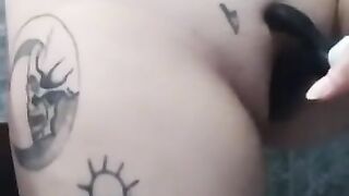 Fucks her pussy hard with a vibrator.