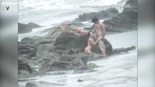 Couple is caught fucking on the beach during storm