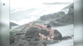 Couple is caught fucking on the beach during storm