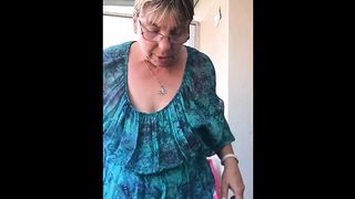 Horny granny shows tits and ass