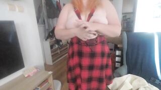 Redhead chubby plays with her big boobies and rides a dick