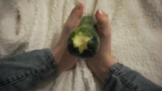 simulating footjob with an huge zucchini by a virgin cute girl