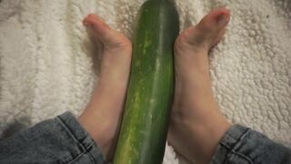 simulating footjob with an huge zucchini by a virgin cute girl