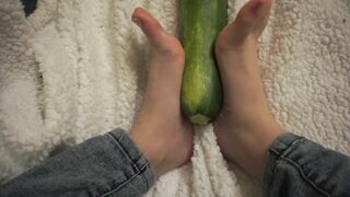 simulating footjob with an huge zucchini by a virgin cute girl