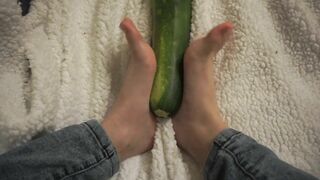 simulating footjob with an huge zucchini by a virgin cute girl