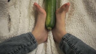 simulating footjob with an huge zucchini by a virgin cute girl