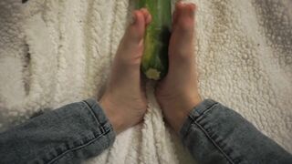 simulating footjob with an huge zucchini by a virgin cute girl