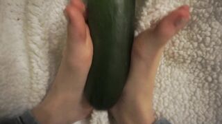 simulating footjob with an huge zucchini by a virgin cute girl