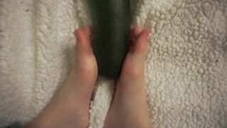 simulating footjob with an huge zucchini by a virgin cute girl