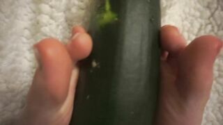 simulating footjob with an huge zucchini by a virgin cute girl