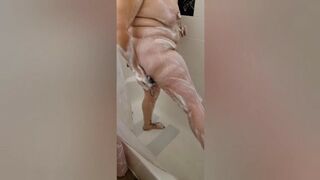 BBW Wendi soaps legs and feet in shower