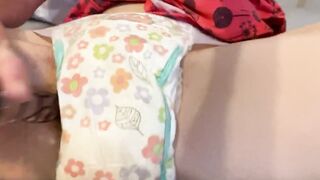 Diaper girl soaks goodnite and wets the bed while masturbating