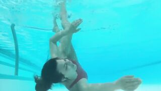 Underwater swimming classics bare feet Asian girl realise swimming costume